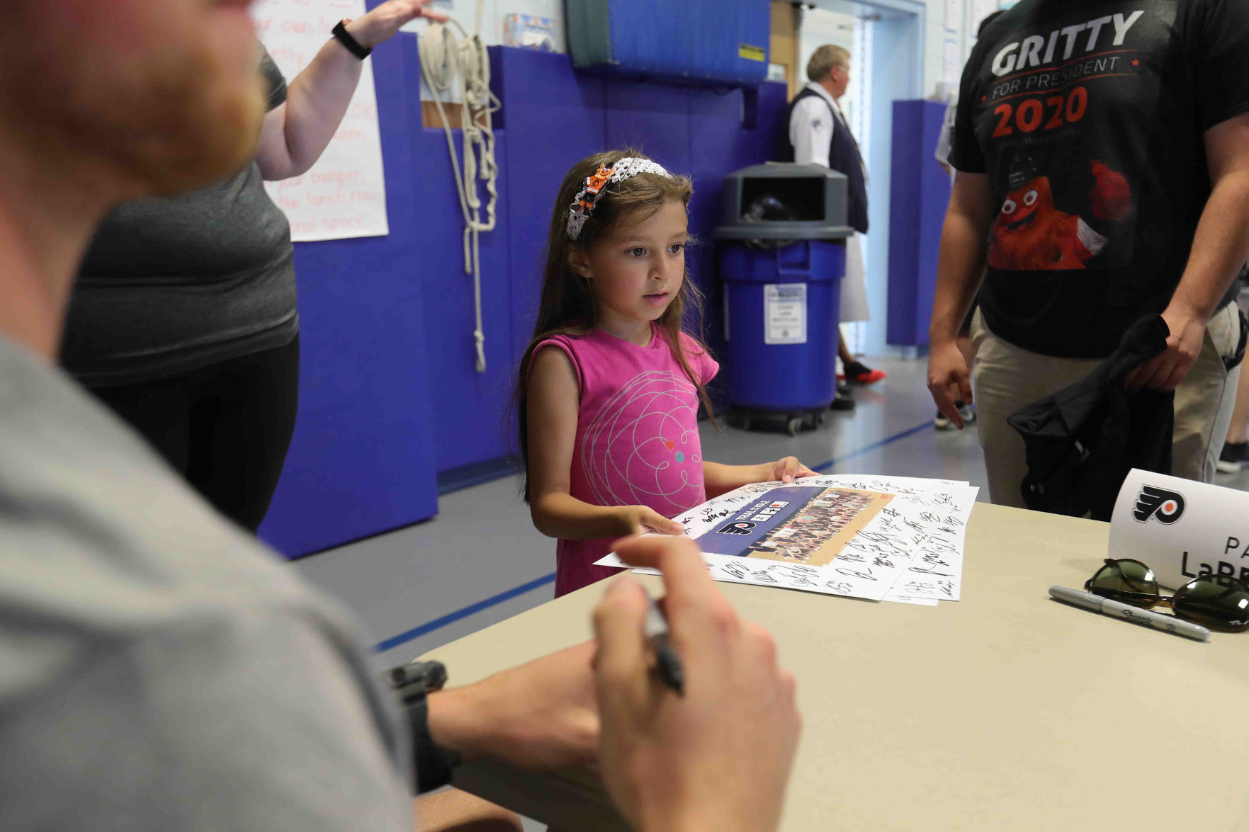 Philadelphia Flyers prospects sign autographs and play volleyball